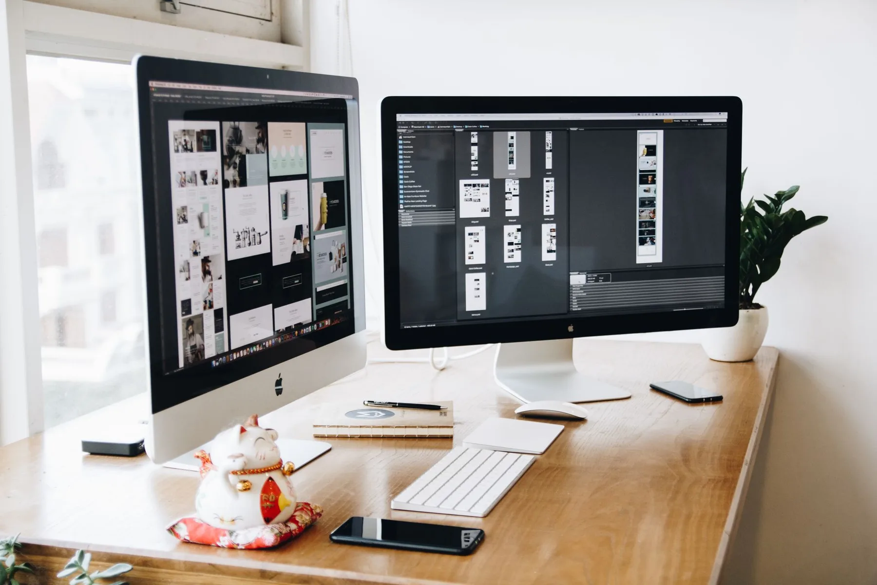 Designer's dual-monitor workspace showing a brand moodboard and layouts in a design app, illustrating branding tools for 2026.