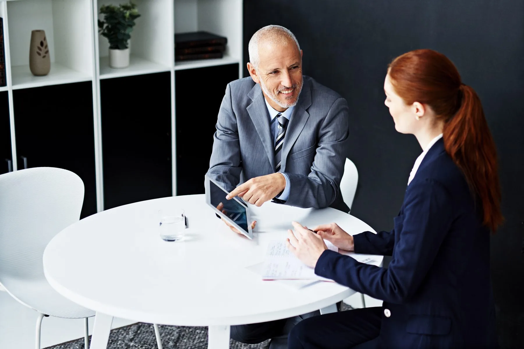 Business meeting with tablet in modern office
